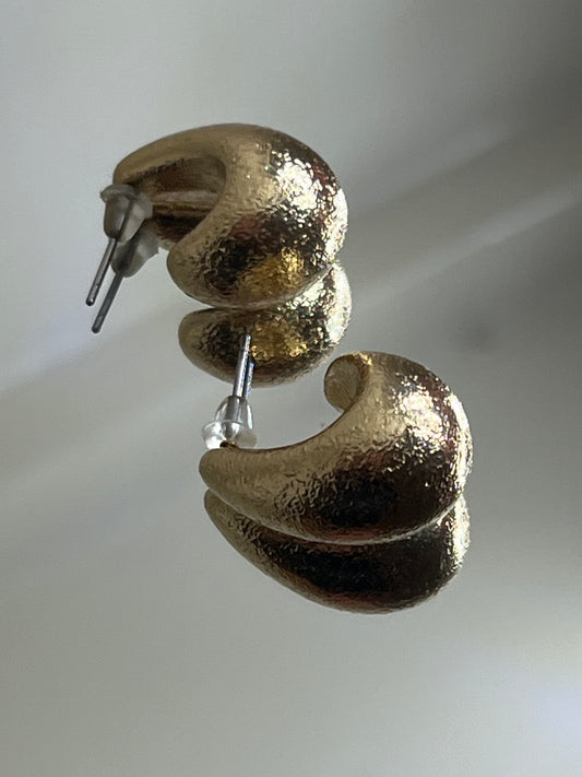 Gold crescent earring